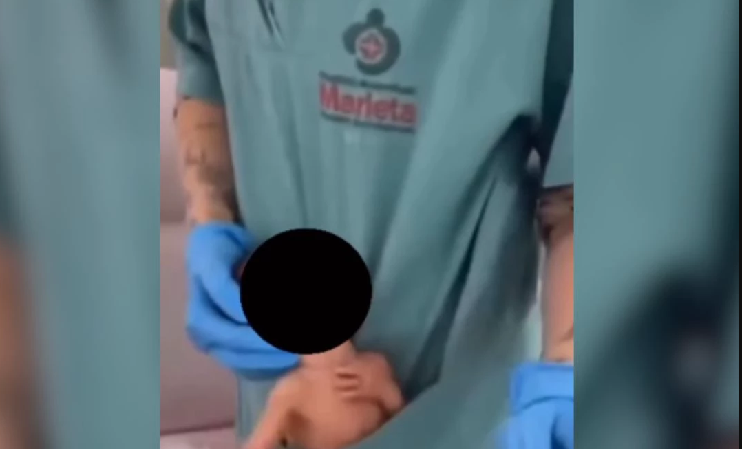 Funcionária é filmada dançando com recém-nascido no bolso do uniforme em hospital; VEJA VÍDEO