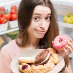Açúcar e tristeza: entenda a relação entre o consumo de doces e o humor