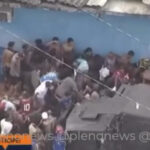 Multidão faminta briga por carga de carne em favela no Rio
