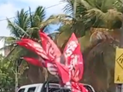Veículo oficial da UFRN é flagrado transportando bandeiras de candidatos do PT em Natal; VEJA VÍDEO